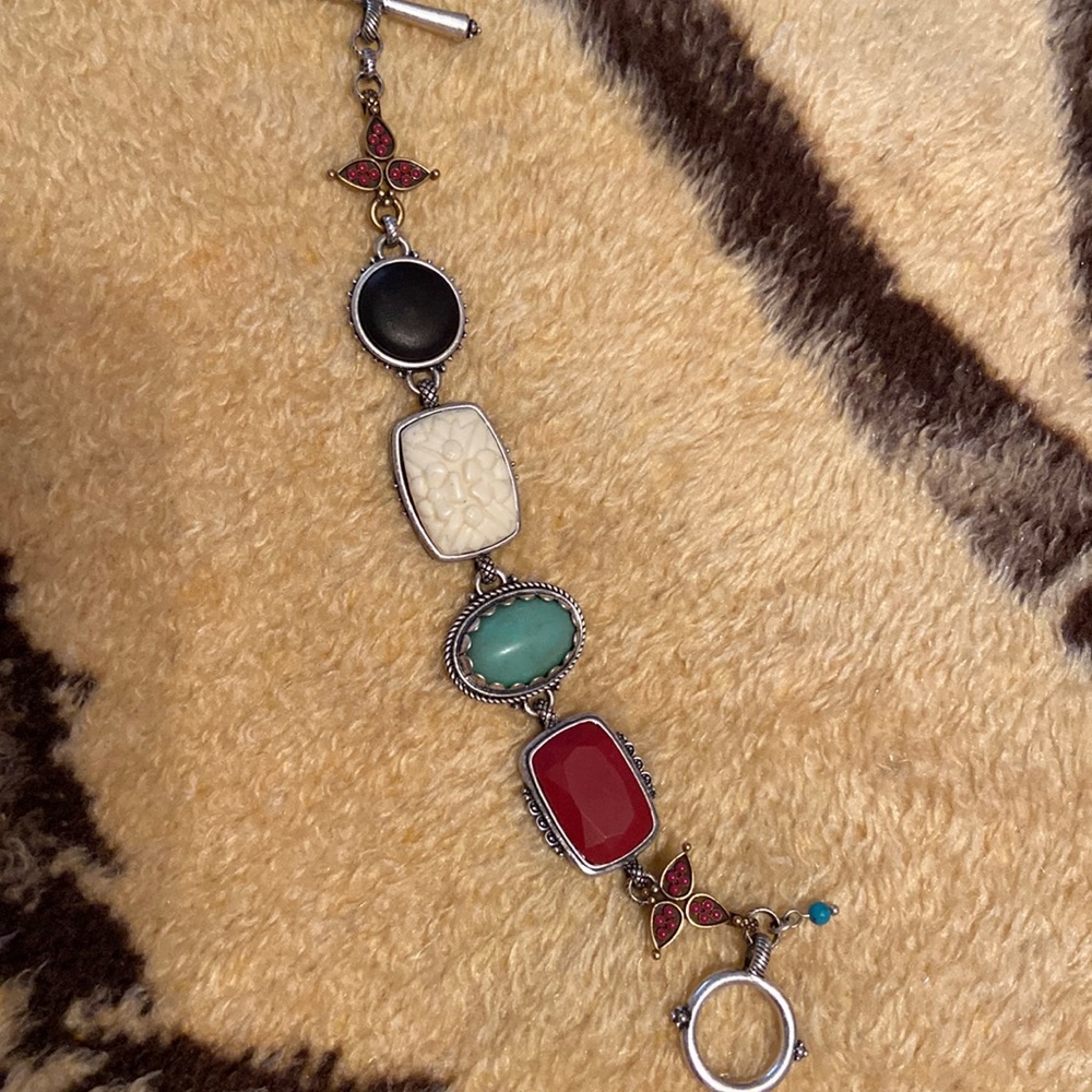 8in Lucky mat silver finish toggle bracelet. Multi colored stones.